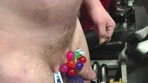 Two hot latex-clad babes have some fun with a raunchy dude